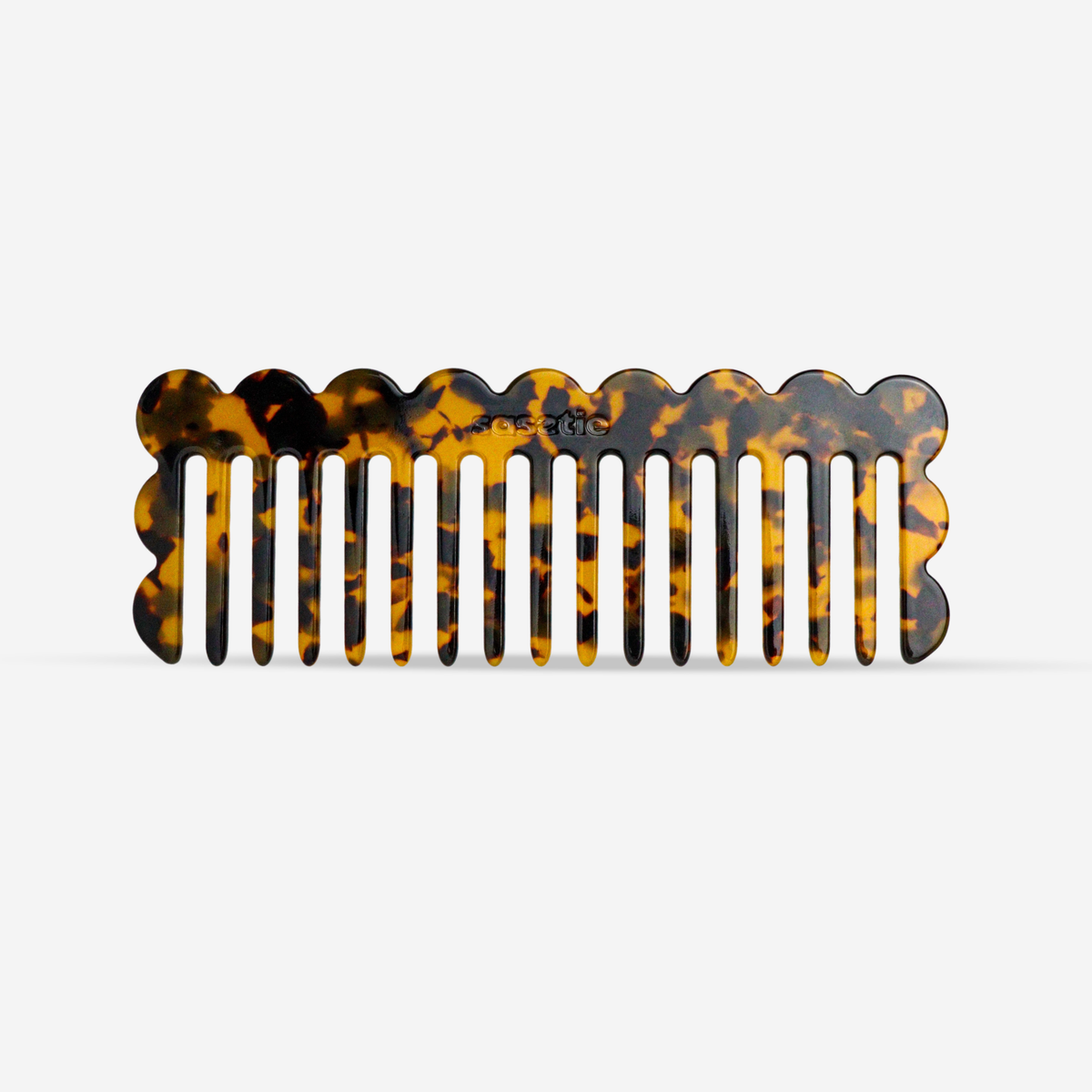 Haaraccessoire - De gebogen kam in donker luipaardpatroon
