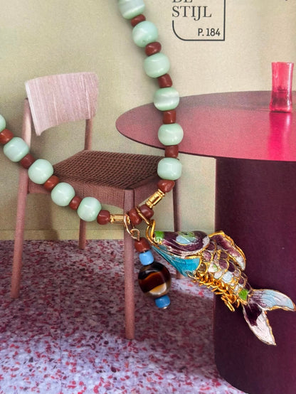 HT ketting: turquoise-blauwe kralen